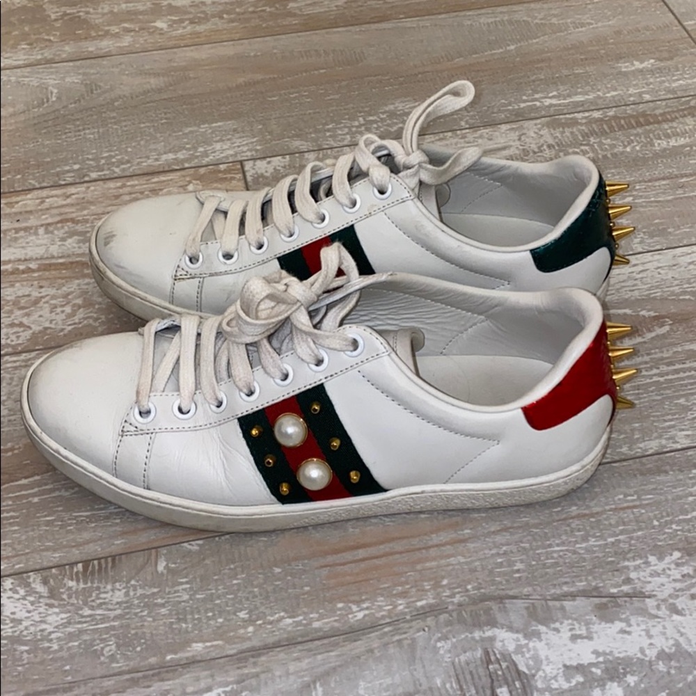 Stud web leather sneakers
